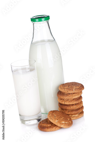 Glass, bottle of milk and cookies