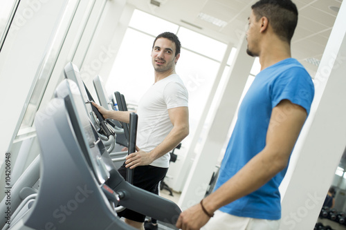 Young multiracial men in the gym