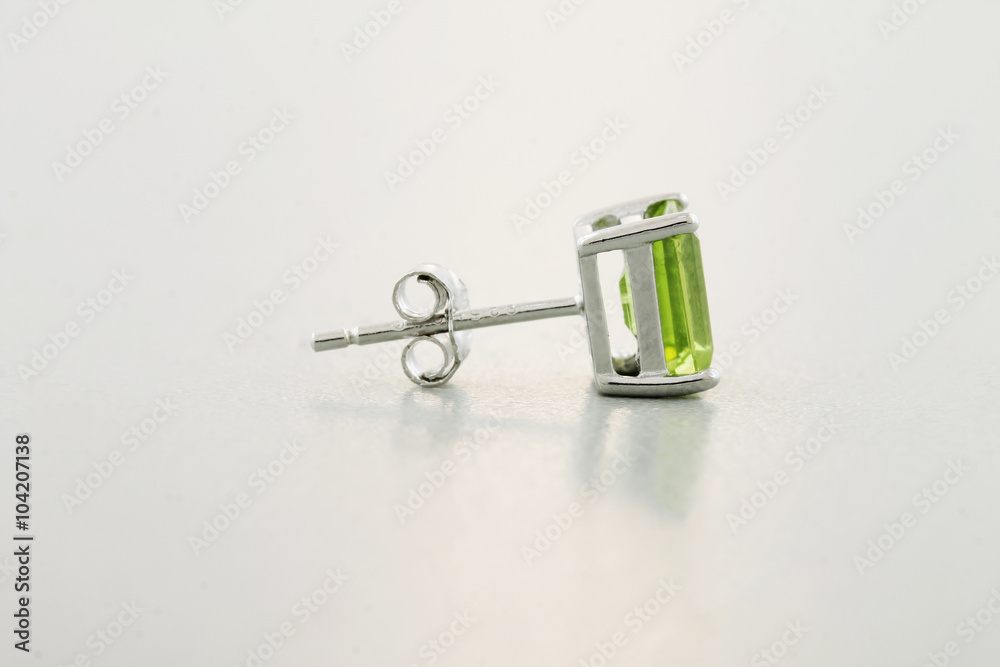 Unedited Photo of an Emerald-Cut Peridot Earring in Silver Unedited Photo of an Emerald-Cut Peridot Earring in Silver