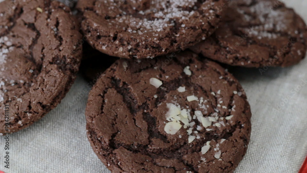 Rotating plate with homemade chocolate cookies with sugar Rotating plate with homemade chocolate cookies with sugar