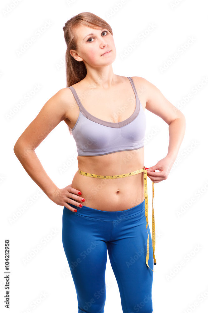 The girl goes in for sports in the studio 