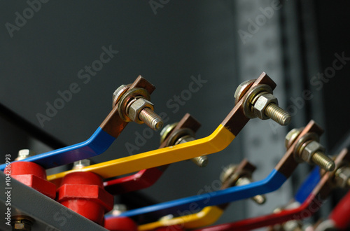 Copper busbar and screw part of an distribution panel