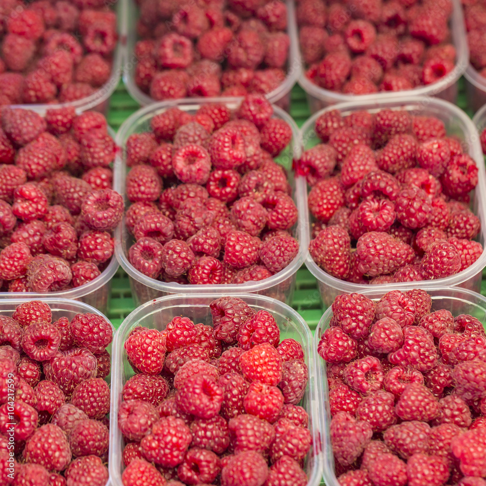 Red raspberries in boxes at local farm market Red raspberries in boxes at local farm market