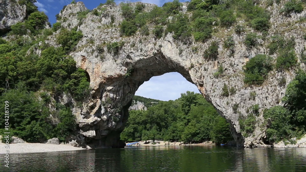 a big rock above the river Rhona and rafting a big rock above the river Rhona and rafting