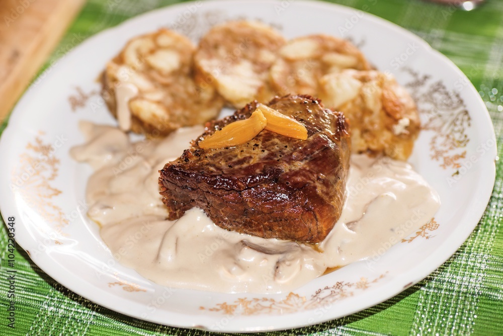 Roasted rib steak with mushroom cream sauce and dumpling Roasted rib steak with mushroom cream sauce and dumpling