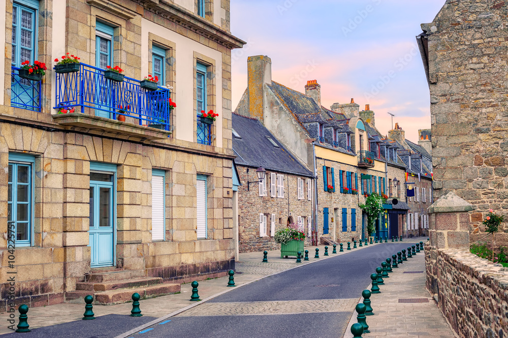 Stone houses on a street in Roscoff, Brittany, France