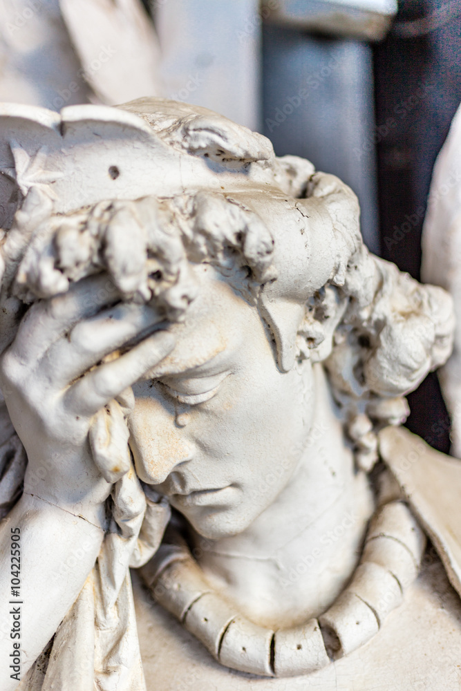 dusted statue of crying angel dusted statue of crying angel