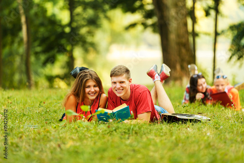 pair successful students with a textbook in a Park 