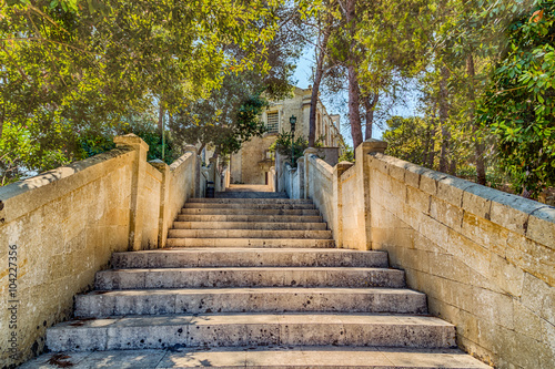 high steps of an ancient staircase photo