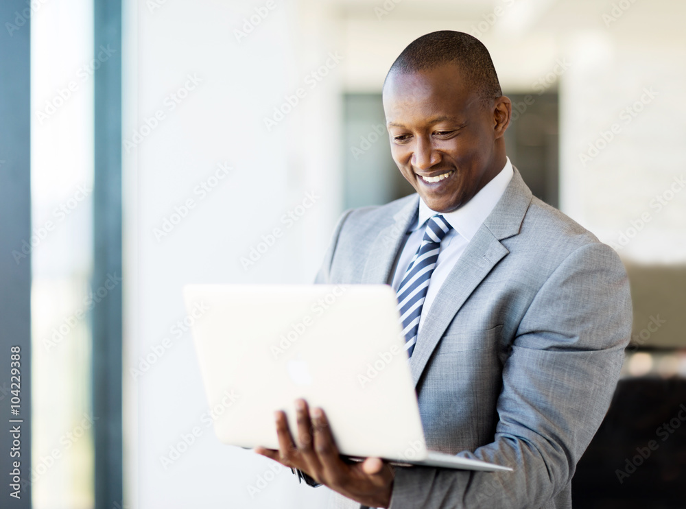 african business man using laptop african business man using laptop
