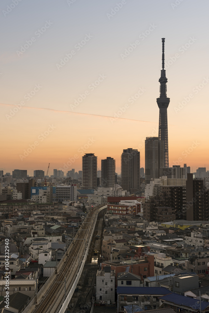Tokyo Skyline at dusk, view of Asakusa district Skytree visible in the distance.