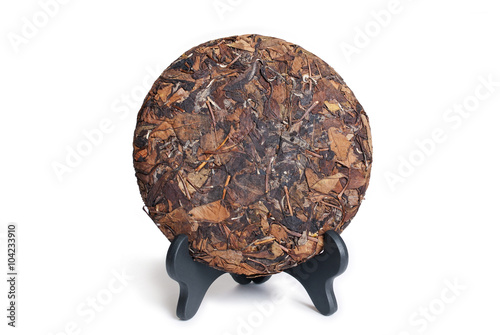 Puerh Raw tea cake isolated