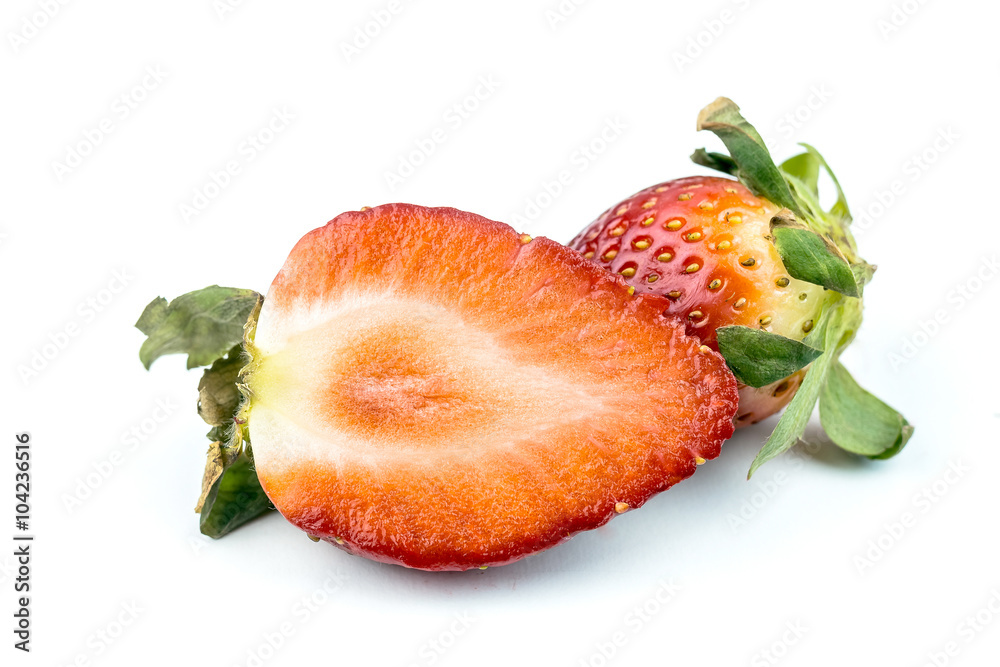 Half of strawberry isolated on white background Half of strawberry isolated on white background