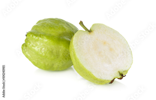 whole and half cut fresh Guava with stem on white background