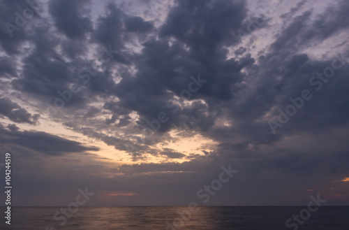 Beautiful sunrise with dramatic sky over Black sea  Crimea
