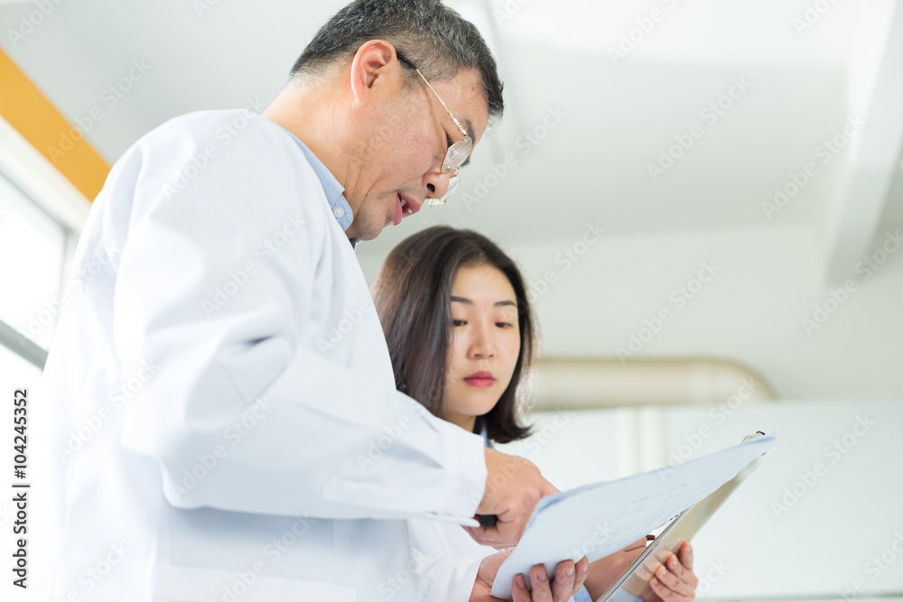 people doing chemical experiment in modern lab people doing chemical experiment in modern lab