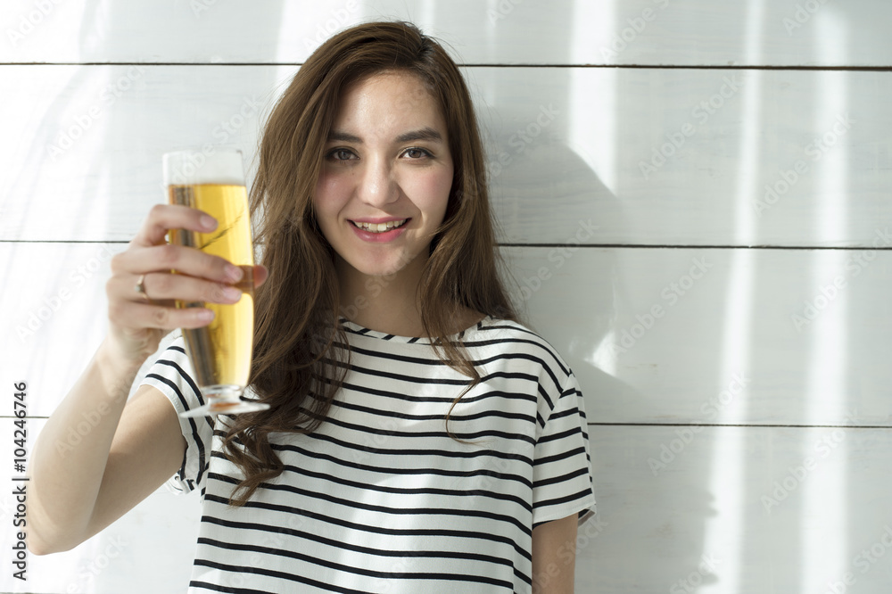 Young women are to toast with beer Young women are to toast with beer