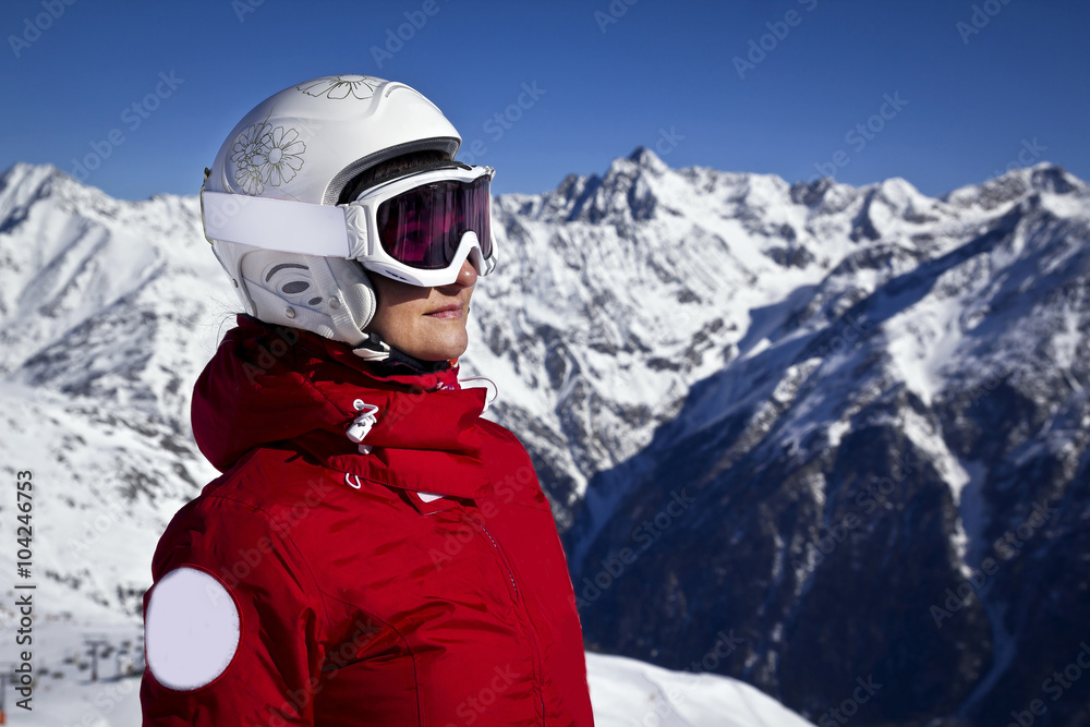 Woman enjoying skiing in alps Woman enjoying skiing in alps
