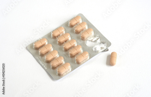 pills, tablets and drugs on white background. 