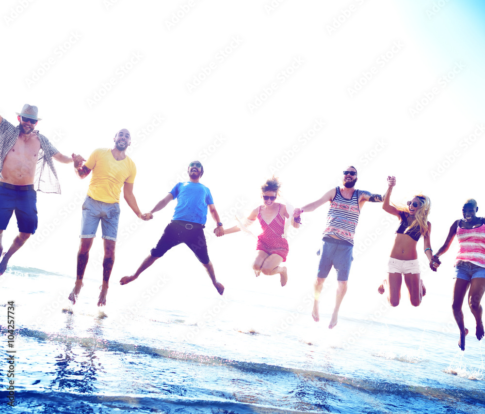 Obraz premium Diverse Beach Summer Friends Fun Jump Shot Concept