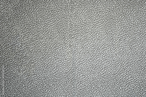 Grey fabric background with leather print