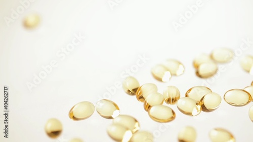 Capsules Omega-3 on the white background