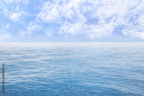 Summer seascape with blue sea and sky background