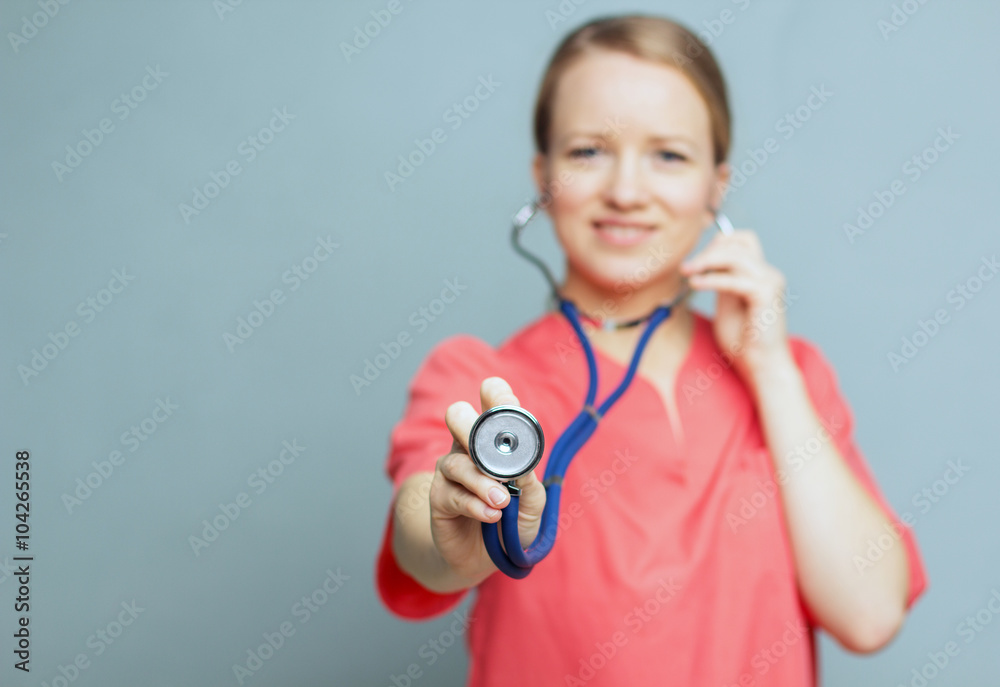 Concept: focus on the stethoscope. Doctor holding a stethoscope. Concept: focus on the stethoscope. Doctor holding a stethoscope.