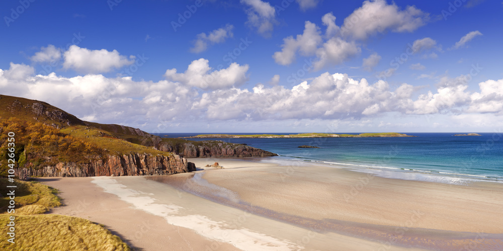 Remote beach on a sunny day, northern coast of Scotland