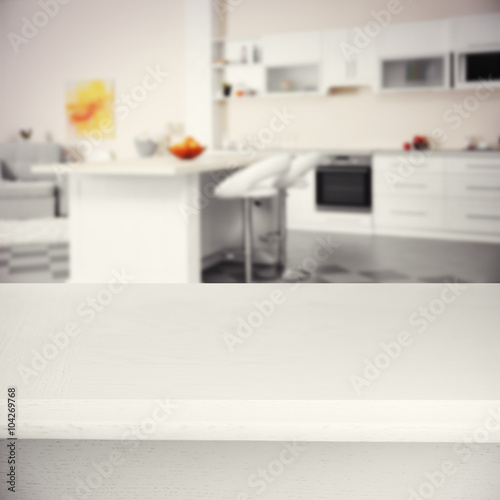 Wooden board on kitchen bac...