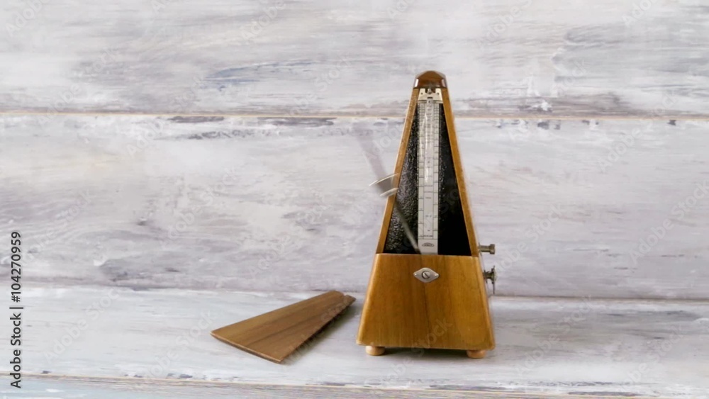 Wooden Mechanical Metronome With Motion Blur Arm device for determining ...