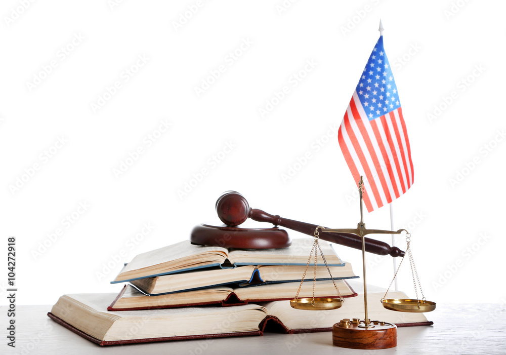 Wooden gavel with justice scales, USA flag and open books on white background