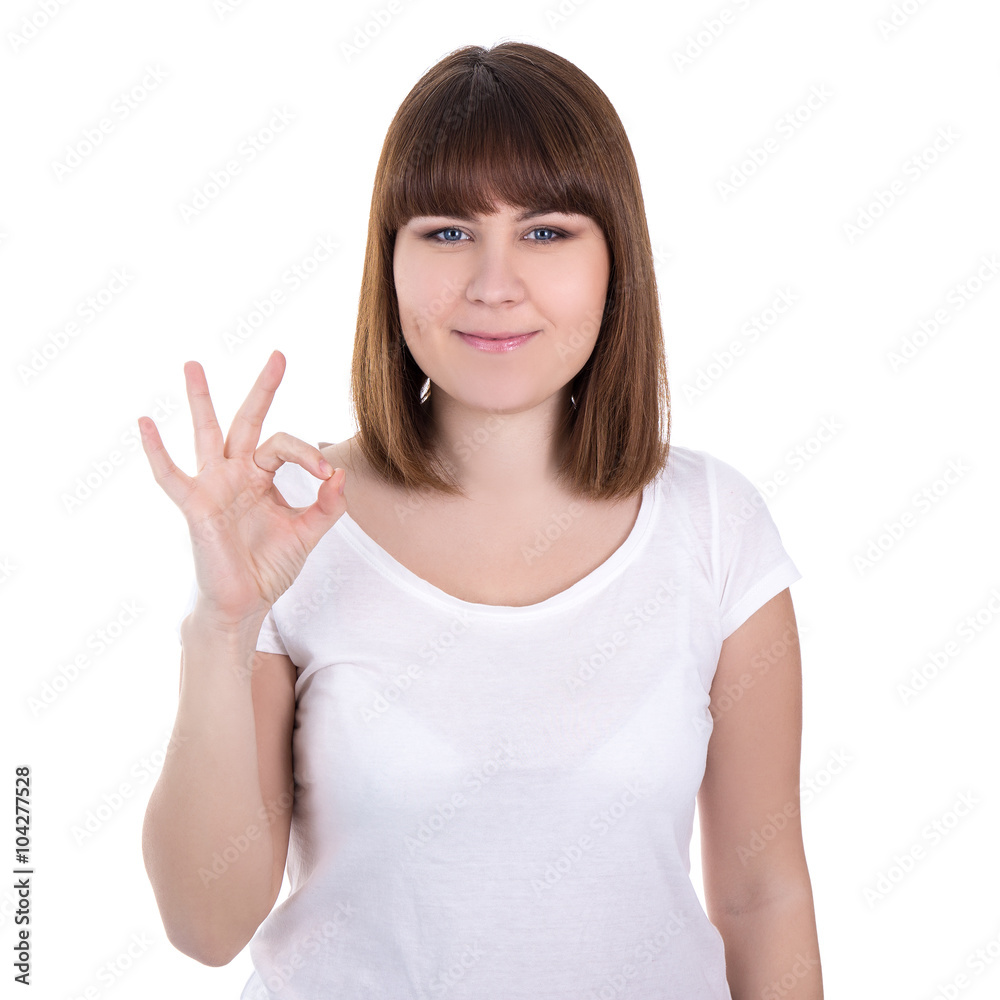 happy young beautiful woman showing ok sign isolated on white happy young beautiful woman showing ok sign isolated on white