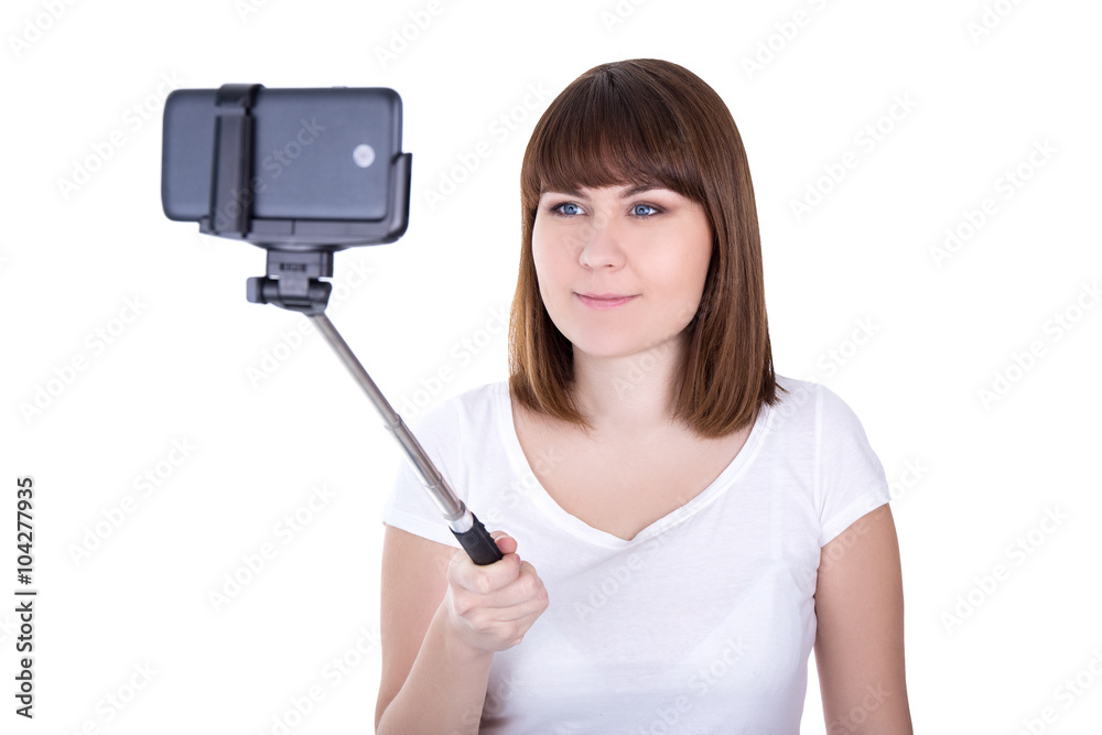 happy young beautiful woman taking photo on smart phone with sel happy young beautiful woman taking photo on smart phone with sel