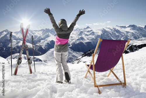 Women at mountains in winter with sun-lounger,France high mountains