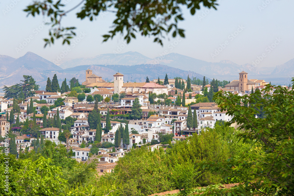 Granada - The look to The Albayzin district and Saint Nicholas church from Generalife gardens