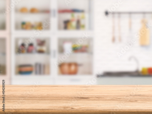 Fototapeta Naklejka Na Ścianę i Meble -  wooden counter top with kitchen cabinet background