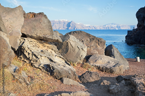 Santorini - The look to caldera across the pumice boulders with the Scaros ans Imerovigili photo