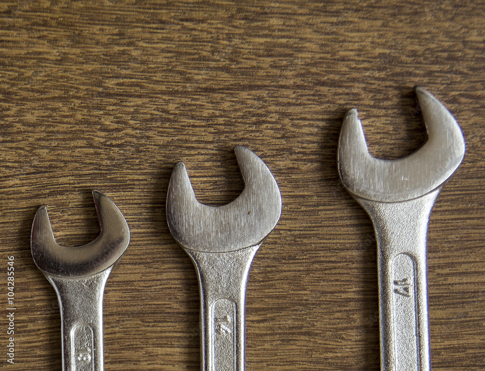 set of mechanical hand tools on wooden background set of mechanical hand tools on wooden background