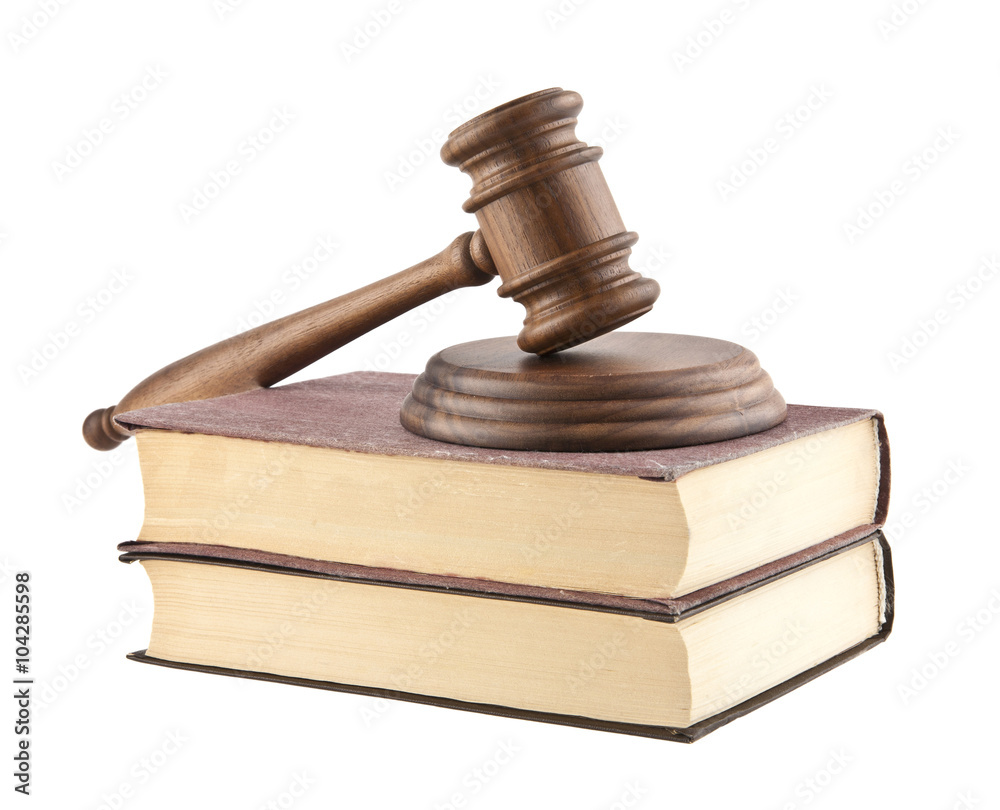 wooden mallet and books wooden mallet and books