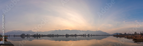 Beautiful panoramic scene at the sunrise of Nagin Bach / Nigeen lake with a row of boathouses. 