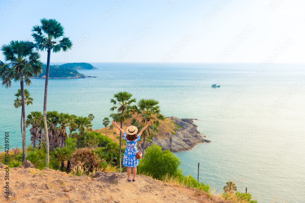 Obraz premium Lady is on her vacation in Phuket enjoy with sightseeing around Laem Phrom Thep where is one of Landmark.