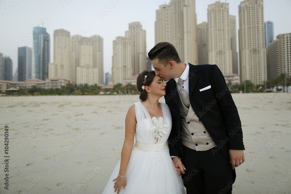 Fotografie Yound grooms, holding  each other