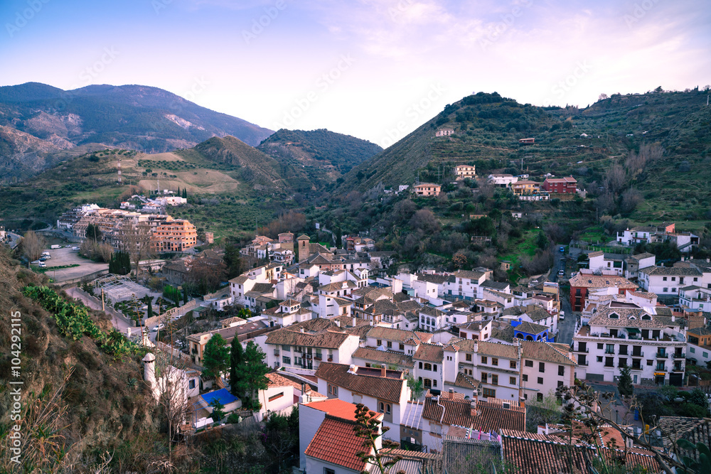 Evening light. Top view of the beautiful village of Monachil. Province of Granada. Spain