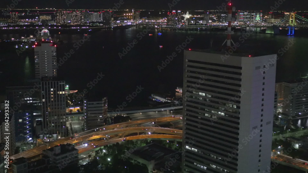 Pan view of Tokyo bay and traffic illumination