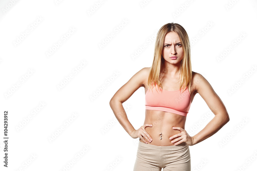 Fototapeta premium Beautiful young girl with perfect body with bad emotion