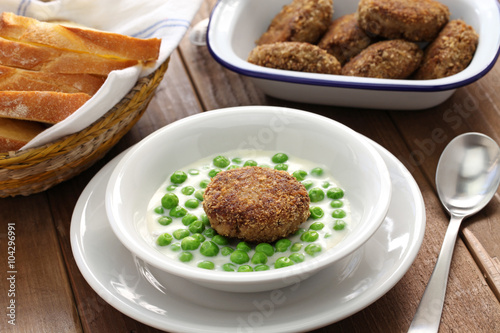 green peas fozelek (thich vegetable stew) and fasirt (fried meatball), hungarian cuisine