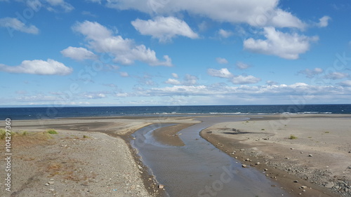 Estuary, blue sky and white cloud 