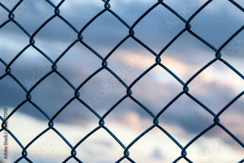 Steel Wire mesh and cloud in Evening Sky background