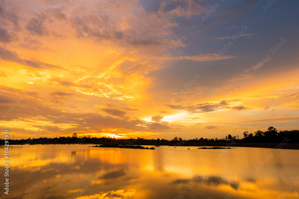 Sunset landscape with  Golden light over the lake